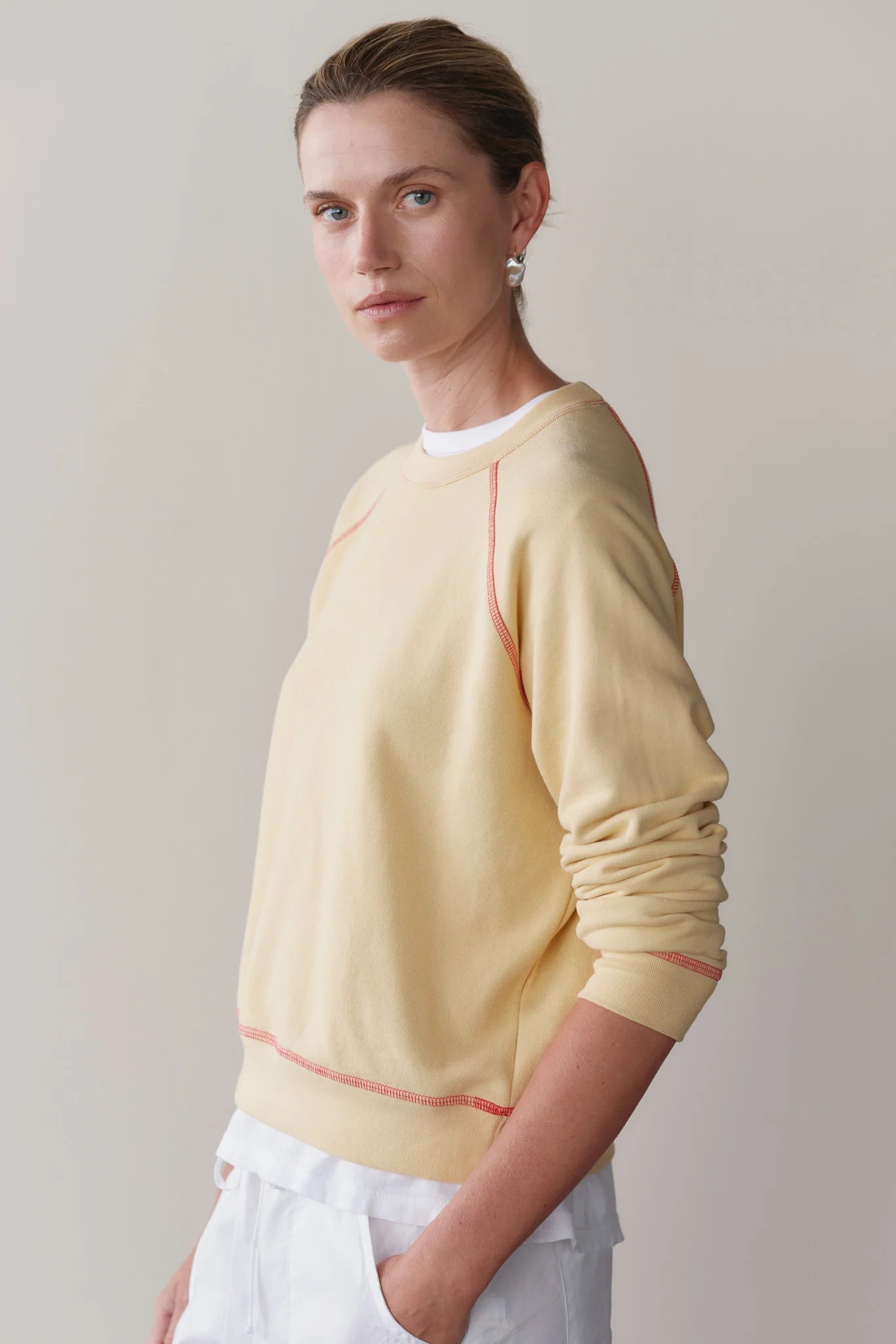 The Eco Terry Sweatshirt in Butter w/ Raspberry Stitching